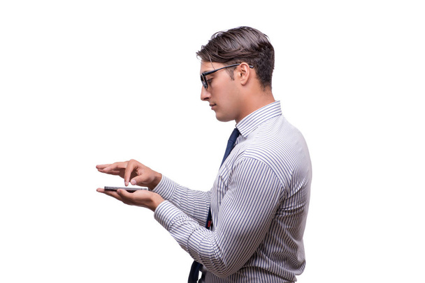 Przystojny biznesmen pracę z telefonu komórkowego na białym tle - Zdjęcie, obraz