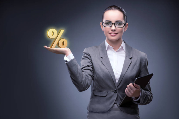 Businesswoman in high interest rates concept - Photo, Image