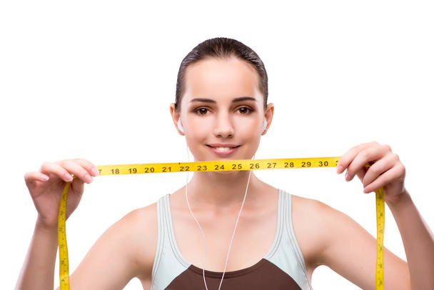 Young woman with centimeter in diet concept - Фото, зображення