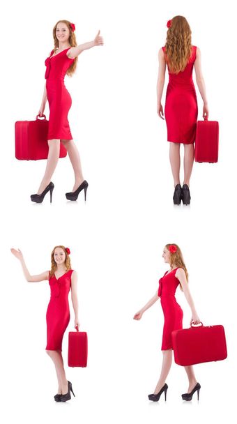 Piros ruhás bőrönddel elszigetelt fehér fiatal nő - Fotó, kép