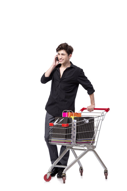 Giovane uomo in concetto di shopping isolato su bianco
 - Foto, immagini