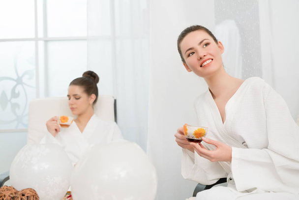 Image of pretty young girls relaxing in spa salon - Foto, Imagen