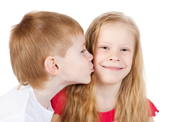 Little boy kissing beautiful little girl - Zdjęcie, obraz