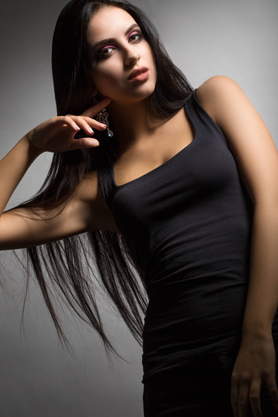 burning brunette with long hair - Foto, Imagen