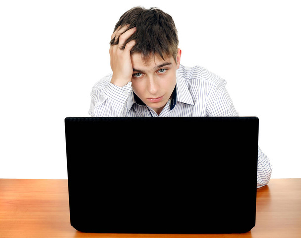 adolescente triste com laptop
 - Foto, Imagem