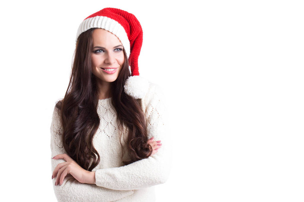 Beautiful smiling woman in santa hat. - Фото, зображення