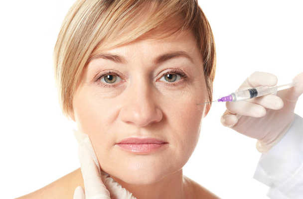 Hyaluronic acid injection for facial rejuvenation procedure - Fotó, kép