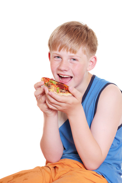 Boy with pizza - Foto, afbeelding