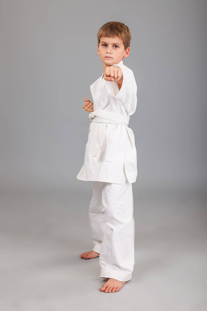 Karate boy in white kimono - Photo, Image