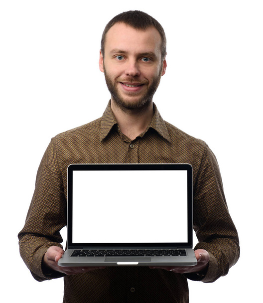 man showing laptop computer with blank screen - Photo, image