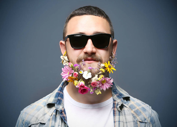 man in sunglasses with beard of flowers - Foto, Imagem