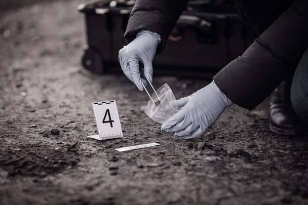 Crime scene investigation - collecting evidence - Photo, image