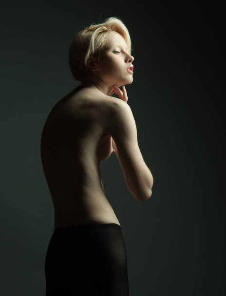 Elegant nude woman with short blond hair. - Photo, image