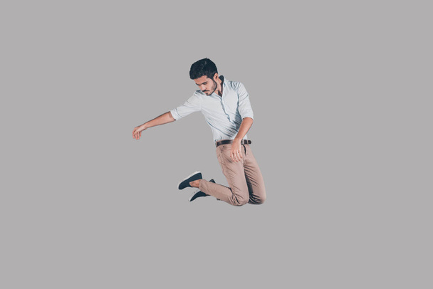 stylish man hovering in air - 写真・画像