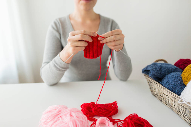 woman hands knitting with needles and yarn - 写真・画像