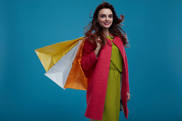 Woman Shopping. Smiling Beautiful Fashion Model With Paper Bags - Fotoğraf, Görsel
