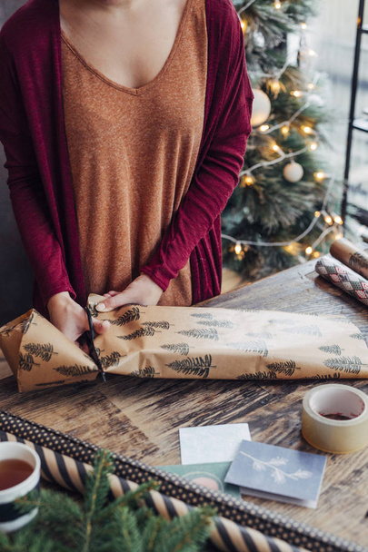 Woman Wrapping Christmas Presents - Фото, зображення