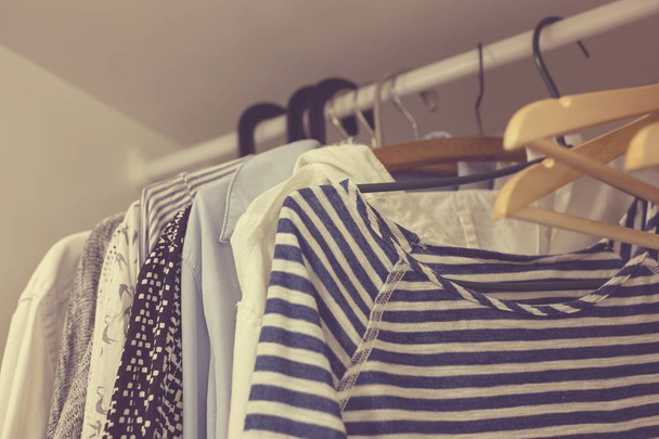 lclothes in the closet on a hanger - selective focus - Foto, Imagem