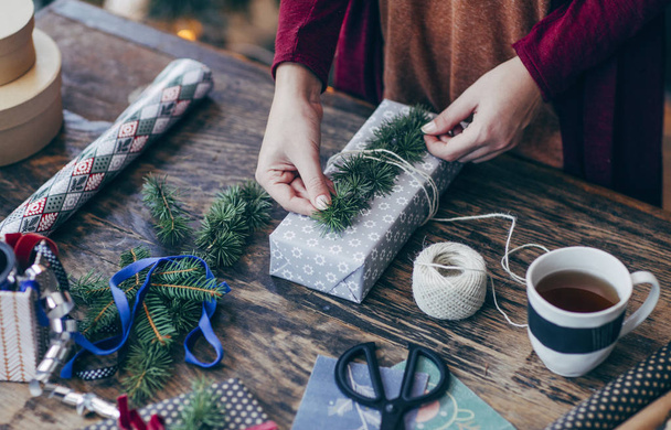 Woman Wrapping Christmas Presents - Foto, imagen