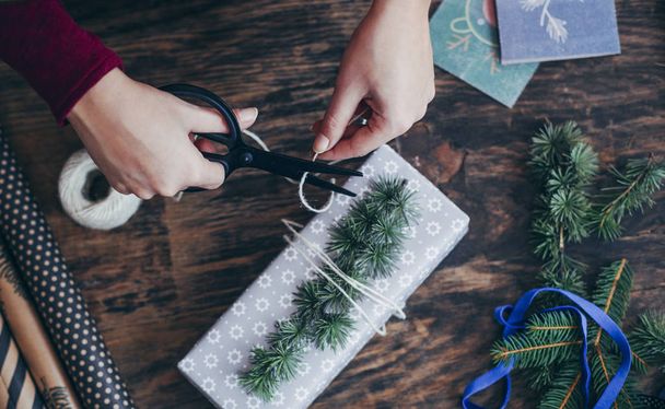 Woman Wrapping Christmas Presents - Valokuva, kuva