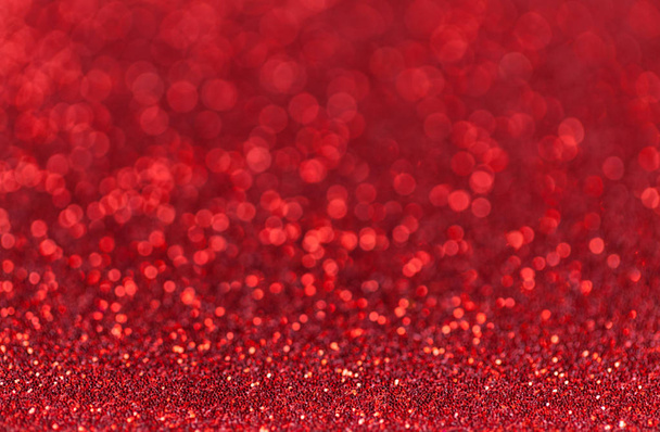 Dark red sparkling background from small sequins, closeup. Brilliant backdrop - Photo, Image