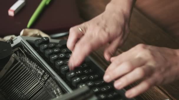 Person working on typewriter - Footage, Video