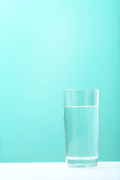 Glass with water on  background - Фото, зображення
