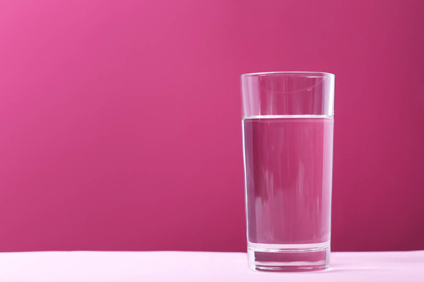 Glass with water on  background - Foto, Imagem
