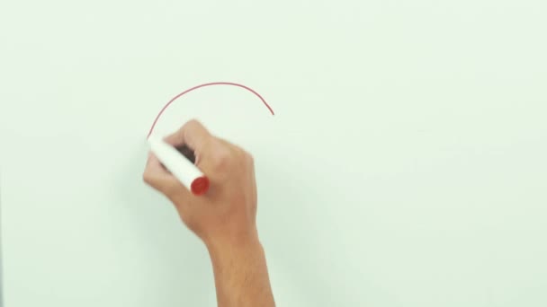 Hand drawn, crayon heart shape isolated on whiteboard - Felvétel, videó