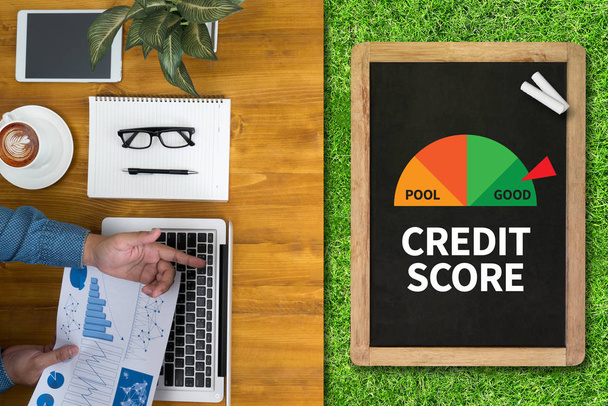 CREDIT SCORE  (Businessman Checking Credit Score Online and Fina - Foto, immagini