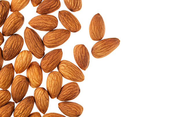 Nuts border of almonds on white background. - Fotografie, Obrázek