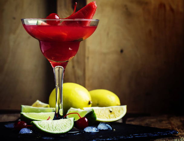 Alcoholic cocktail with watermelon, lemon, lime, tequila and ice  - Zdjęcie, obraz