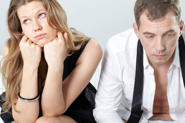 couple sitting together displeased  - Photo, Image