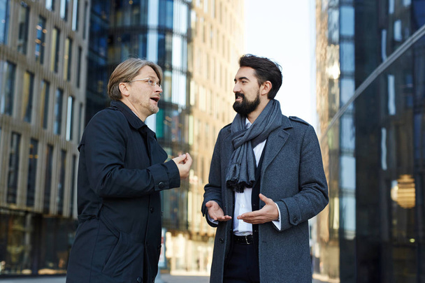 business men having conversation
 - Фото, изображение