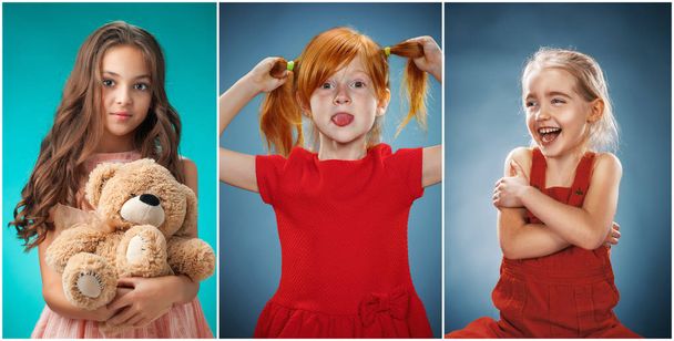 The cute cheerful little girls on blue background - Foto, immagini