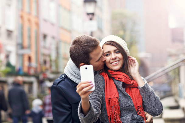 Young couple taking selfie  - Photo, Image