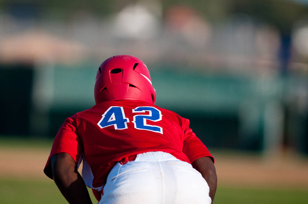 Γυμνάσιο Αφρικής Αμερικανός παίκτης του μπέιζμπολ - Φωτογραφία, εικόνα