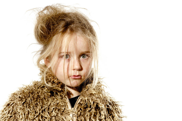 Surprised disheveled preschooler girl with long hair - Photo, image