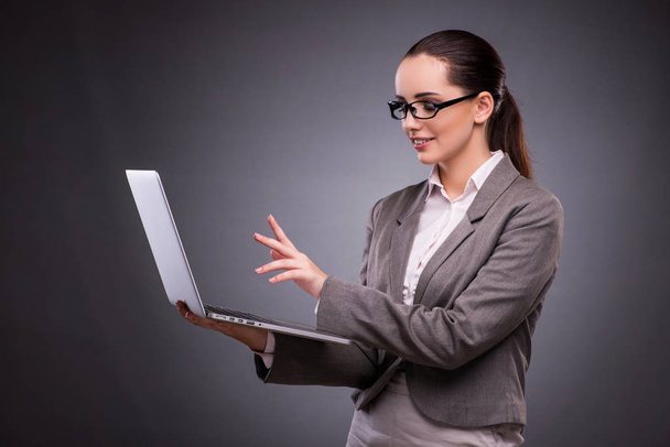 Businesswoman with laptop in business concept - Φωτογραφία, εικόνα