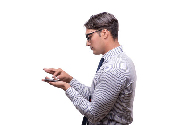 Красивый бизнесмен работает с мобильным телефоном изолирован на белом
 - Фото, изображение