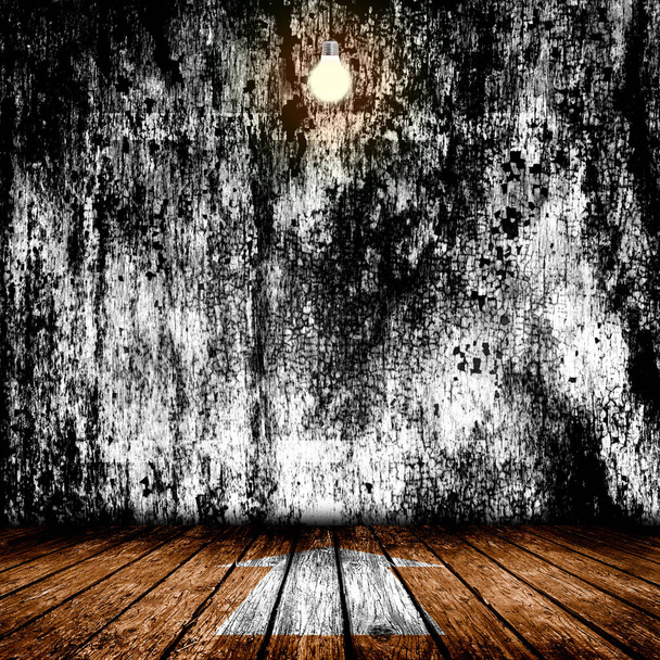 Висячая лампочка в пустой бетонной комнате
  - Фото, изображение