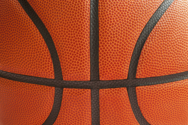 Close up tiro de uma bola de basquete mostrando as costuras
 - Foto, Imagem