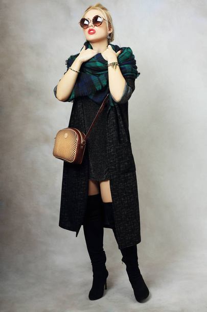 woman in dark coat and bag - Photo, image