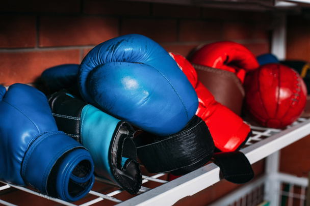 Boxing gloves on shelf - Photo, Image