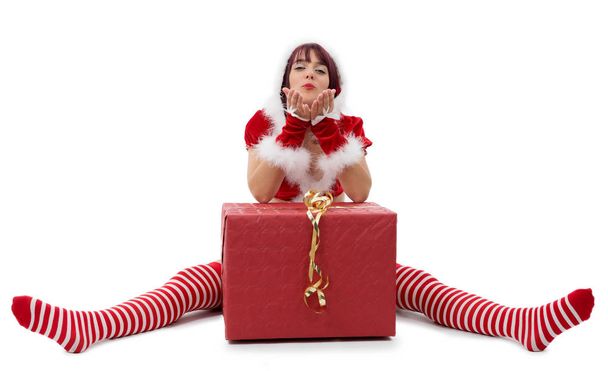 bella ragazza vestita da Babbo Natale sul pavimento
 - Foto, immagini