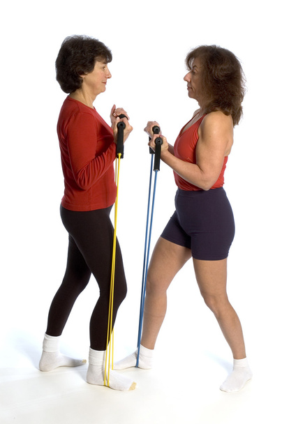 Dos mujeres haciendo ejercicio
 - Foto, Imagen