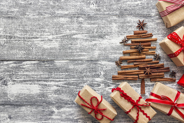 Christmas fir tree made from spices cinnamon sticks, anise star  - Фото, зображення