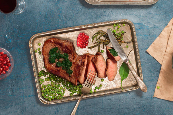 Sliced grilled tenderloin Steak roast beef with chimichurri sauc - 写真・画像