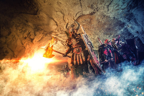 Battle of powerful knights in heavy armor in the Dungeon. Mighty - Photo, Image