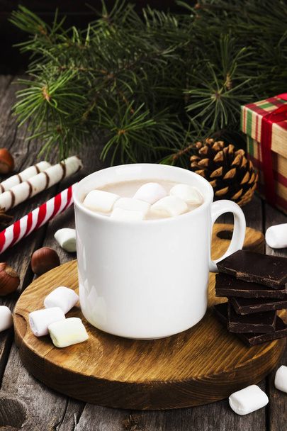 Cup of hot cocoa with marshmallows on a dark background. Toning - Foto, Imagen